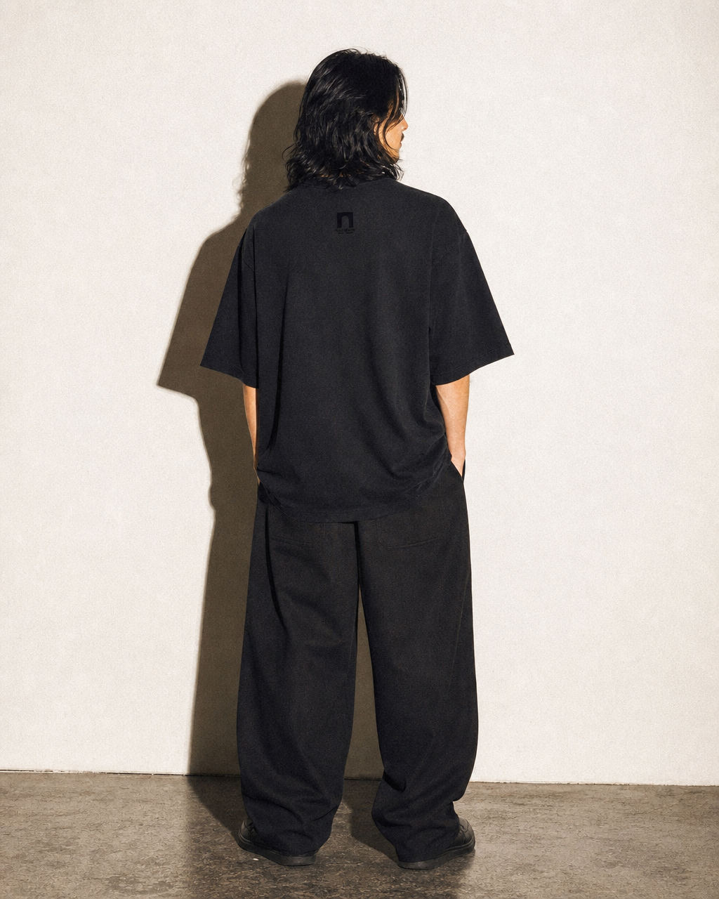 'Two Figures at a Table' Oversized One-Piece T-Shirt